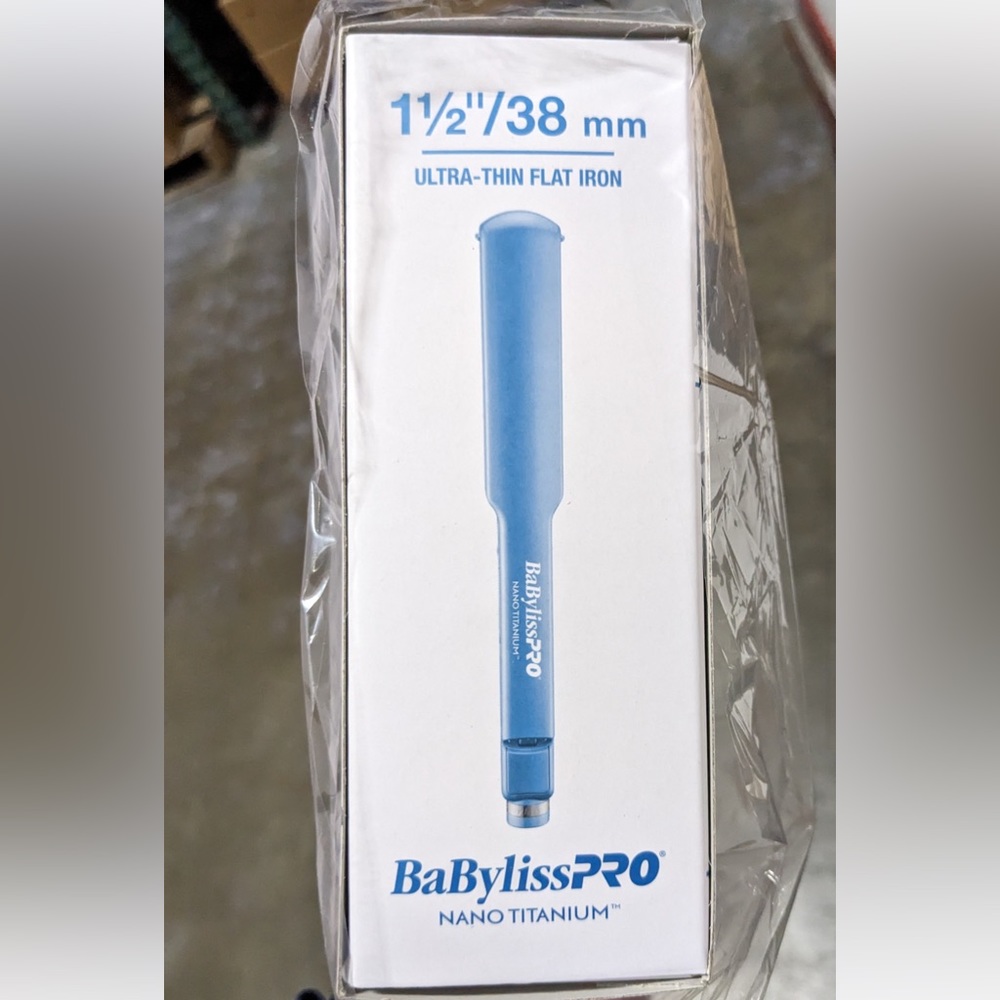 BabyByliss hair straightener. New and in unopened package as shown.